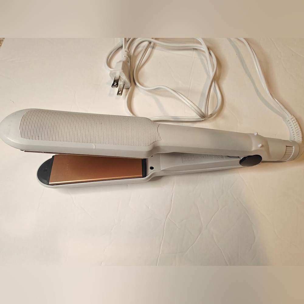 Conair Double Ceramic Flat Iron, featuring wide plates for fast styling on long
